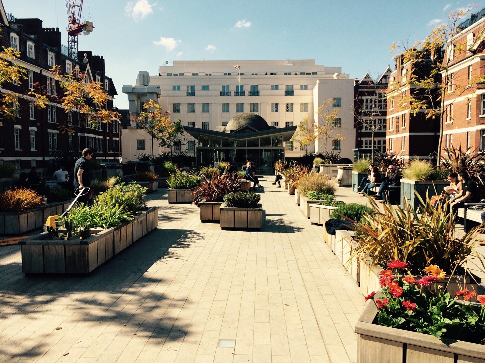 Brown Hart Gardens in Mayfair, a paved garden with planters and a domed pavilion built on the roof of an electricity substation